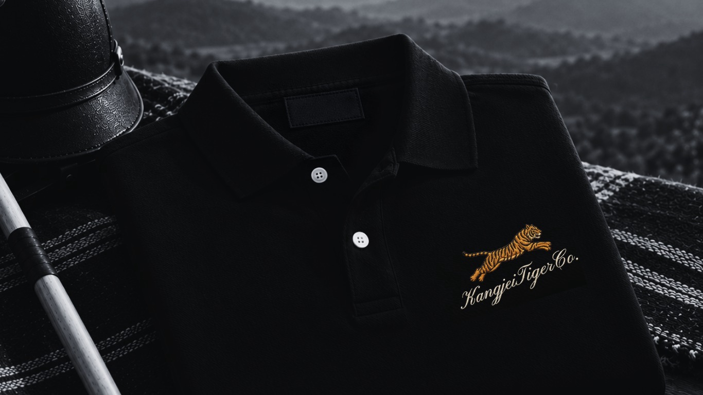 Folded Kangjei Tiger Co. polo with mallet and helmet overlooking the misty hills of Manipur